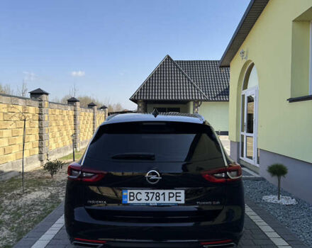 Чорний Опель Інсігнія, об'ємом двигуна 1.96 л та пробігом 240 тис. км за 13999 $, фото 5 на Automoto.ua