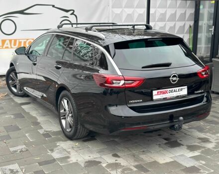 Черный Опель Инсигния, объемом двигателя 2 л и пробегом 324 тыс. км за 13900 $, фото 1 на Automoto.ua