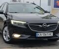 Черный Опель Инсигния, объемом двигателя 1.6 л и пробегом 183 тыс. км за 17781 $, фото 1 на Automoto.ua