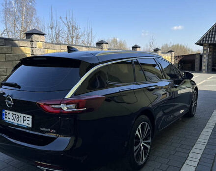 Чорний Опель Інсігнія, об'ємом двигуна 1.96 л та пробігом 240 тис. км за 13999 $, фото 4 на Automoto.ua