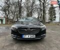 Черный Опель Инсигния, объемом двигателя 2 л и пробегом 240 тыс. км за 18900 $, фото 3 на Automoto.ua