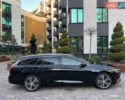 Черный Опель Инсигния, объемом двигателя 1.96 л и пробегом 241 тыс. км за 15900 $, фото 5 на Automoto.ua