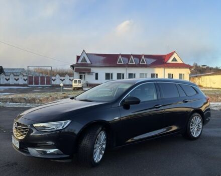 Черный Опель Инсигния, объемом двигателя 2 л и пробегом 260 тыс. км за 12800 $, фото 1 на Automoto.ua