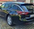 Чорний Опель Інсігнія, об'ємом двигуна 2 л та пробігом 227 тис. км за 15999 $, фото 7 на Automoto.ua