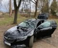 Чорний Опель Інсігнія, об'ємом двигуна 1.96 л та пробігом 212 тис. км за 14300 $, фото 4 на Automoto.ua