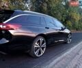 Черный Опель Инсигния, объемом двигателя 2 л и пробегом 215 тыс. км за 16800 $, фото 4 на Automoto.ua