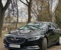 Чорний Опель Інсігнія, об'ємом двигуна 1.96 л та пробігом 212 тис. км за 14300 $, фото 3 на Automoto.ua