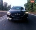 Черный Опель Инсигния, объемом двигателя 2 л и пробегом 215 тыс. км за 16800 $, фото 5 на Automoto.ua