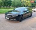 Чорний Опель Інсігнія, об'ємом двигуна 1.96 л та пробігом 268 тис. км за 15999 $, фото 1 на Automoto.ua