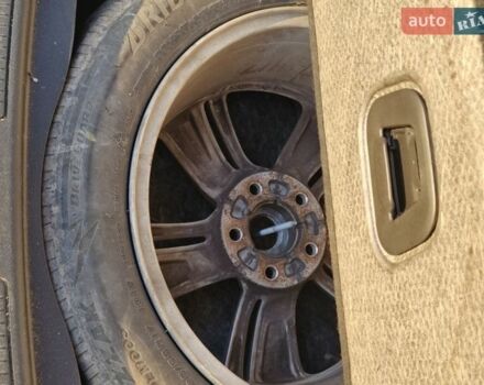 Чорний Опель Інсігнія, об'ємом двигуна 1.6 л та пробігом 154 тис. км за 16300 $, фото 4 на Automoto.ua