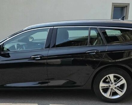 Черный Опель Инсигния, объемом двигателя 2 л и пробегом 25 тыс. км за 18400 $, фото 2 на Automoto.ua