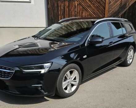 Черный Опель Инсигния, объемом двигателя 2 л и пробегом 25 тыс. км за 18400 $, фото 1 на Automoto.ua