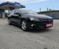 Черный Опель Инсигния, объемом двигателя 2 л и пробегом 154 тыс. км за 17600 $, фото 1 на Automoto.ua
