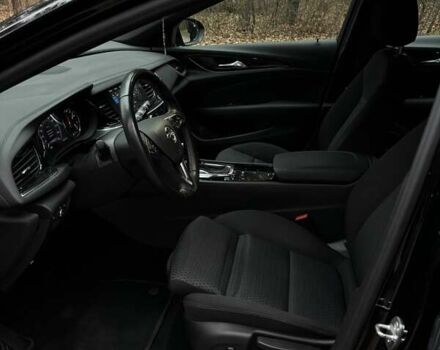 Черный Опель Инсигния, объемом двигателя 1.96 л и пробегом 168 тыс. км за 18800 $, фото 15 на Automoto.ua