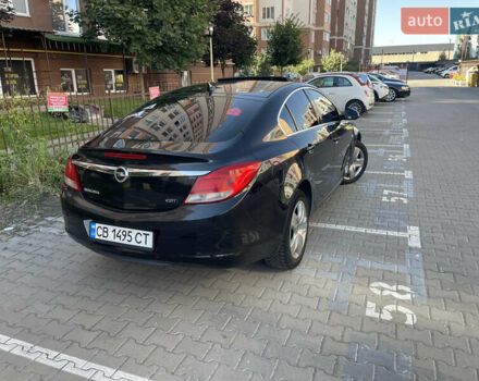 Чорний Опель Інсігнія, об'ємом двигуна 1.96 л та пробігом 250 тис. км за 6666 $, фото 5 на Automoto.ua