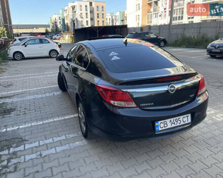 Чорний Опель Інсігнія, об'ємом двигуна 1.96 л та пробігом 250 тис. км за 6666 $, фото 6 на Automoto.ua