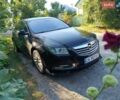 Чорний Опель Інсігнія, об'ємом двигуна 2 л та пробігом 240 тис. км за 5986 $, фото 1 на Automoto.ua