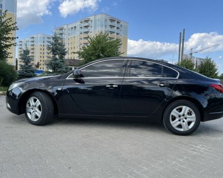 Чорний Опель Інсігнія, об'ємом двигуна 2 л та пробігом 170 тис. км за 6299 $, фото 2 на Automoto.ua