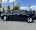 Чорний Опель Інсігнія, об'ємом двигуна 2 л та пробігом 170 тис. км за 6299 $, фото 2 на Automoto.ua