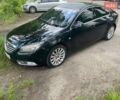 Черный Опель Инсигния, объемом двигателя 1.96 л и пробегом 230 тыс. км за 6400 $, фото 1 на Automoto.ua