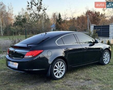 Черный Опель Инсигния, объемом двигателя 1.96 л и пробегом 242 тыс. км за 6999 $, фото 6 на Automoto.ua