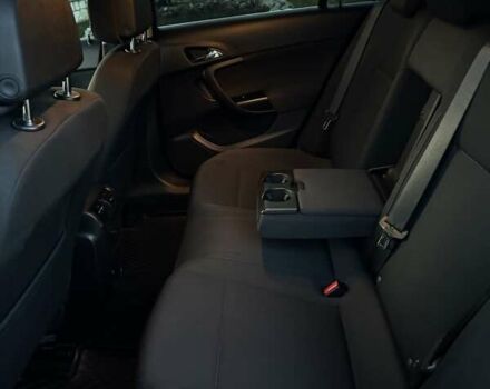 Черный Опель Инсигния, объемом двигателя 1.96 л и пробегом 242 тыс. км за 6999 $, фото 2 на Automoto.ua