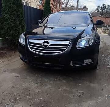 Чорний Опель Інсігнія, об'ємом двигуна 1.96 л та пробігом 175 тис. км за 9950 $, фото 5 на Automoto.ua