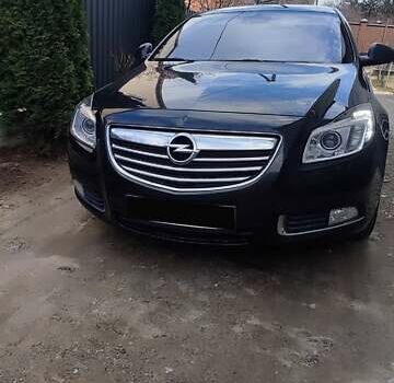Чорний Опель Інсігнія, об'ємом двигуна 1.96 л та пробігом 175 тис. км за 9950 $, фото 2 на Automoto.ua