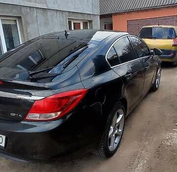 Чорний Опель Інсігнія, об'ємом двигуна 1.96 л та пробігом 175 тис. км за 9950 $, фото 11 на Automoto.ua