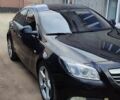 Чорний Опель Інсігнія, об'ємом двигуна 1.96 л та пробігом 175 тис. км за 9950 $, фото 1 на Automoto.ua