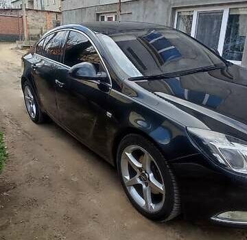 Чорний Опель Інсігнія, об'ємом двигуна 1.96 л та пробігом 175 тис. км за 9950 $, фото 1 на Automoto.ua