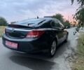Чорний Опель Інсігнія, об'ємом двигуна 1.6 л та пробігом 150 тис. км за 9195 $, фото 1 на Automoto.ua