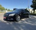 Черный Опель Инсигния, объемом двигателя 1.6 л и пробегом 150 тыс. км за 9545 $, фото 1 на Automoto.ua