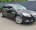 Чорний Опель Інсігнія, об'ємом двигуна 1.96 л та пробігом 296 тис. км за 9000 $, фото 1 на Automoto.ua