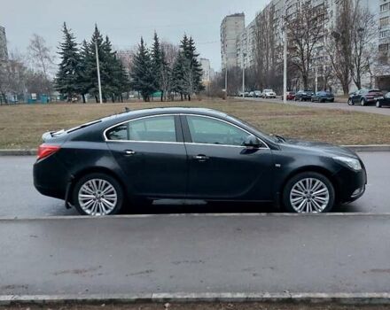 Черный Опель Инсигния, объемом двигателя 1.96 л и пробегом 380 тыс. км за 7500 $, фото 1 на Automoto.ua