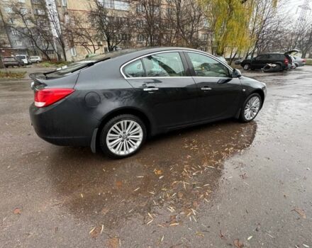 Черный Опель Инсигния, объемом двигателя 2 л и пробегом 266 тыс. км за 7700 $, фото 1 на Automoto.ua