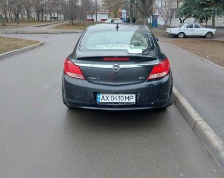 Черный Опель Инсигния, объемом двигателя 1.96 л и пробегом 380 тыс. км за 7500 $, фото 3 на Automoto.ua