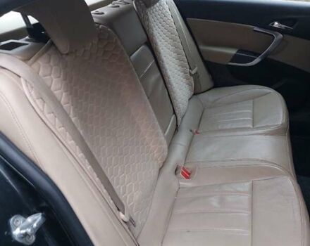 Черный Опель Инсигния, объемом двигателя 1.96 л и пробегом 380 тыс. км за 7500 $, фото 5 на Automoto.ua