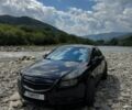 Чорний Опель Інсігнія, об'ємом двигуна 1.96 л та пробігом 270 тис. км за 10999 $, фото 1 на Automoto.ua