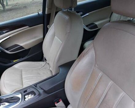 Черный Опель Инсигния, объемом двигателя 1.96 л и пробегом 380 тыс. км за 7500 $, фото 6 на Automoto.ua