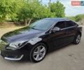 Черный Опель Инсигния, объемом двигателя 1.96 л и пробегом 211 тыс. км за 12450 $, фото 1 на Automoto.ua