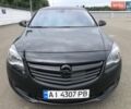 Черный Опель Инсигния, объемом двигателя 2 л и пробегом 180 тыс. км за 13200 $, фото 1 на Automoto.ua