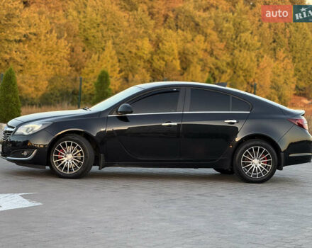 Чорний Опель Інсігнія, об'ємом двигуна 1.96 л та пробігом 260 тис. км за 11000 $, фото 2 на Automoto.ua