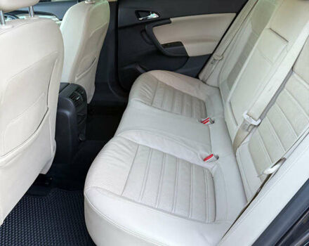 Чорний Опель Інсігнія, об'ємом двигуна 1.96 л та пробігом 260 тис. км за 11000 $, фото 17 на Automoto.ua