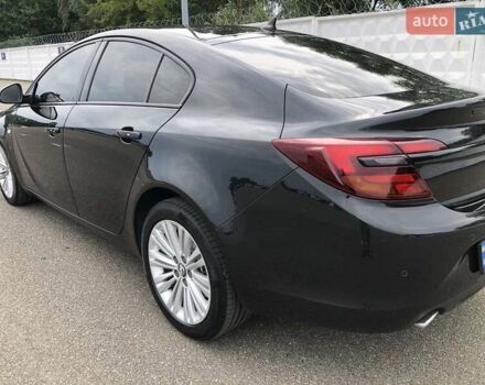 Чорний Опель Інсігнія, об'ємом двигуна 2 л та пробігом 180 тис. км за 13200 $, фото 2 на Automoto.ua