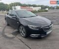 Чорний Опель Інсігнія, об'ємом двигуна 1.6 л та пробігом 225 тис. км за 13333 $, фото 1 на Automoto.ua