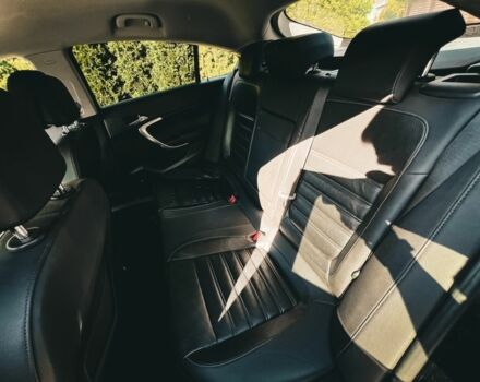 Черный Опель Инсигния, объемом двигателя 1.6 л и пробегом 271 тыс. км за 12700 $, фото 3 на Automoto.ua