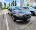 Чорний Опель Інсігнія, об'ємом двигуна 1.6 л та пробігом 176 тис. км за 12200 $, фото 1 на Automoto.ua