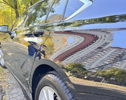 Черный Опель Инсигния, объемом двигателя 1.96 л и пробегом 118 тыс. км за 19900 $, фото 2 на Automoto.ua