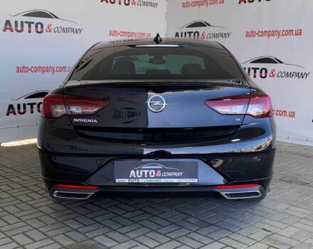 Черный Опель Инсигния, объемом двигателя 2 л и пробегом 140 тыс. км за 19950 $, фото 3 на Automoto.ua
